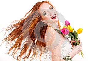 Beautiful redheaded girl with flying hair