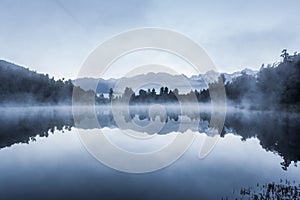 Beautiful reflections of Southern Alps at Lake Matheson
