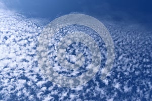 Beautiful and relaxing cirrus clouds high in a deep blue sky