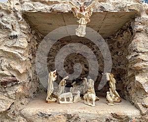A beautiful representation of the Christmas nativity scene, inside a cave.