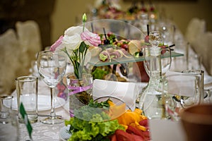 Beautiful restaurant interior table decoration for wedding or event. Flower Wedding