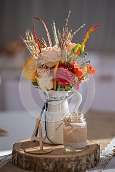 Beautiful restaurant interior table decoration for wedding or event. Flower Wedding Table Decoration/ Autumn colors.