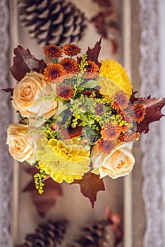 Beautiful restaurant interior table decoration for wedding or event. Flower Wedding Table Decoration/ Autumn colors.