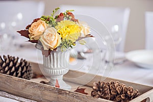 Beautiful restaurant interior table decoration for wedding or event. Flower Wedding Table Decoration/ Autumn colors.