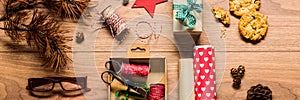 Beautiful retro christmas gift wrapping, xmas concept, DIY desk view from above