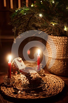 Beautiful retro holiday decor, birthday party. Burning candles and lights in the dark, Christmas