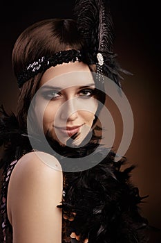 Beautiful retro woman in 20s style party outfit
