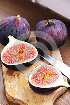 Beautiful ripe fresh pulpy figs on the table