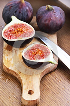 Beautiful ripe fresh pulpy figs on the table