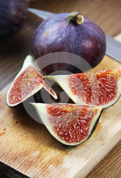 Beautiful ripe fresh pulpy figs on the table