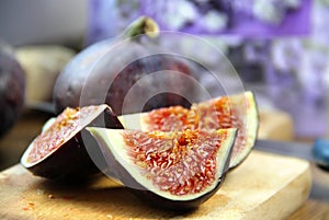 Beautiful ripe fresh pulpy figs on the table