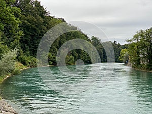 beautiful river flowing on the side of medieval city