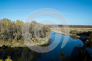 Beautiful river among the forest and ravines. Among the birches and pines.