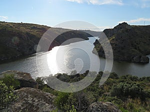 Beautiful river forming the very high cliffs and deep photo