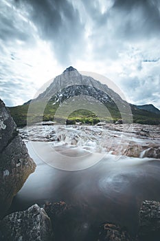 Beautiful river mountain landscape scenery in Glen Coe, Scottish Highlands, Scotland