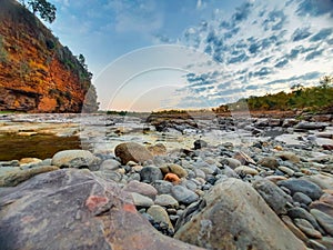 A beautiful river surrounded by rocky mountain at Chidiya Bhadak, Indore, Madhya Pradesh, India