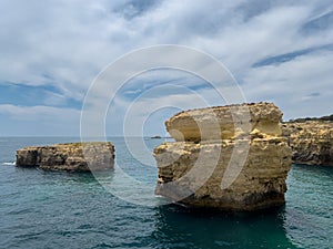 Beautiful rock formations in Olhos de Agua in Portugal photo