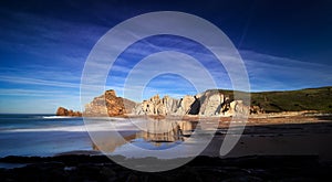 Beautiful rock formations on Playa de Portio, Cantabria, Spain photo