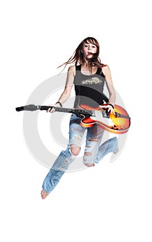 Beautiful rock-n-roll girl jump with guitar