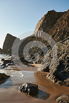 Beautiful rocks on Amalia Beach Praia da Amalia on the west of Algarve, Portugal