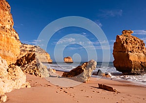 Beautiful rocky beach praia da marinha near