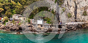 beautiful rocky berth of Punta Chiappa near Portofino in Liguria with sea walkway horizontal italy background