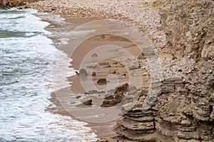 Beautiful rocky cliffs near the beach at Praia do Tonel in Sagres, Portugal in the Algarve