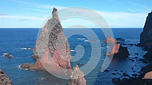 Beautiful rocky coastline in the Atlantic Ocean. Coast of Madeira.