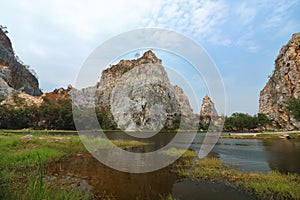 Beautiful Rocky mountain with water lake of khao Ngu Stone Park , Ratchaburi , Thailand.