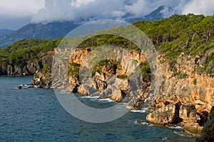 Beautiful rocky ocean coast waves meet rocks