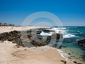 Beautiful rocky and sandy beach in Portugal in summer