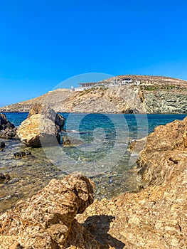 Beautiful rocky scenery near Koubara beach in Ios island Cyclades, Greece photo