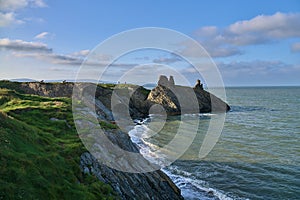 Beautiful rocky seascape and Black Castle ruins along Wicklow coastal line  South Quay  Corporation Lands  Co. Wicklow  Ireland