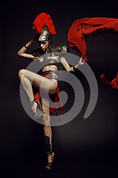 Beautiful Roman woman in armour and helmet