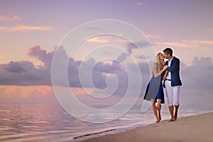 Beautiful romantic couple on a tropical beach