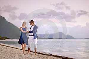 Beautiful romantic couple on a tropical beach