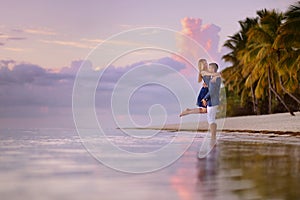 Beautiful romantic couple on a tropical beach