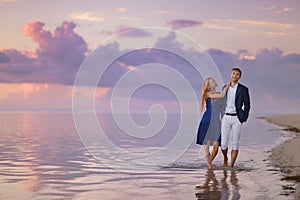 Beautiful romantic couple on a tropical beach