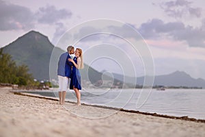 Beautiful romantic couple on a tropical beach