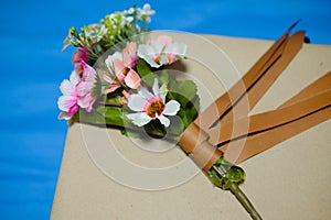 Beautiful romantic gift box and artificial flower bouquet