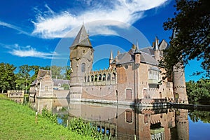Beautiful romantic medieval dutch moated water castle, green garden park - Kasteel Heeswijk, Netherlands