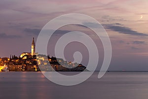 Beautiful romantic old town of Rovinj after magical sunset and moon on the sky,Istrian Peninsula,Croatia,Europe