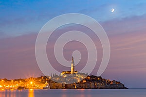 Beautiful romantic old town of Rovinj after magical sunset and moon on the sky,Istrian Peninsula,Croatia,Europe