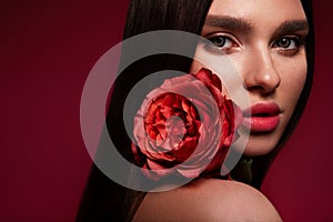 Beautiful romantic young woman with rose. Inspiration of spring and summer. Perfume, cosmetics concept.
