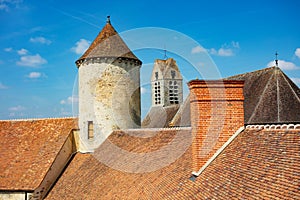 Beautiful roof old tower and walls of Blandy-les-Tours castle