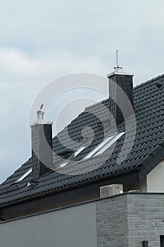 beautiful roof and two chimneys