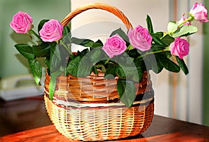 Beautiful roses in a basket