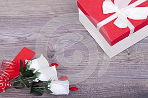 Beautiful roses and a gift box