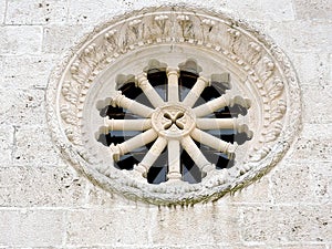 Beautiful rosette - an architectural detail on a christian catholic church