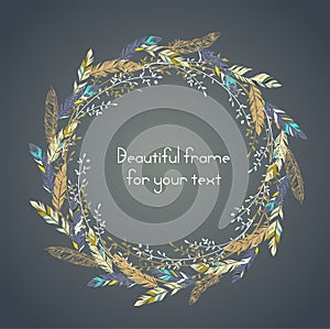 Beautiful round frame with feathers and some floral elements.